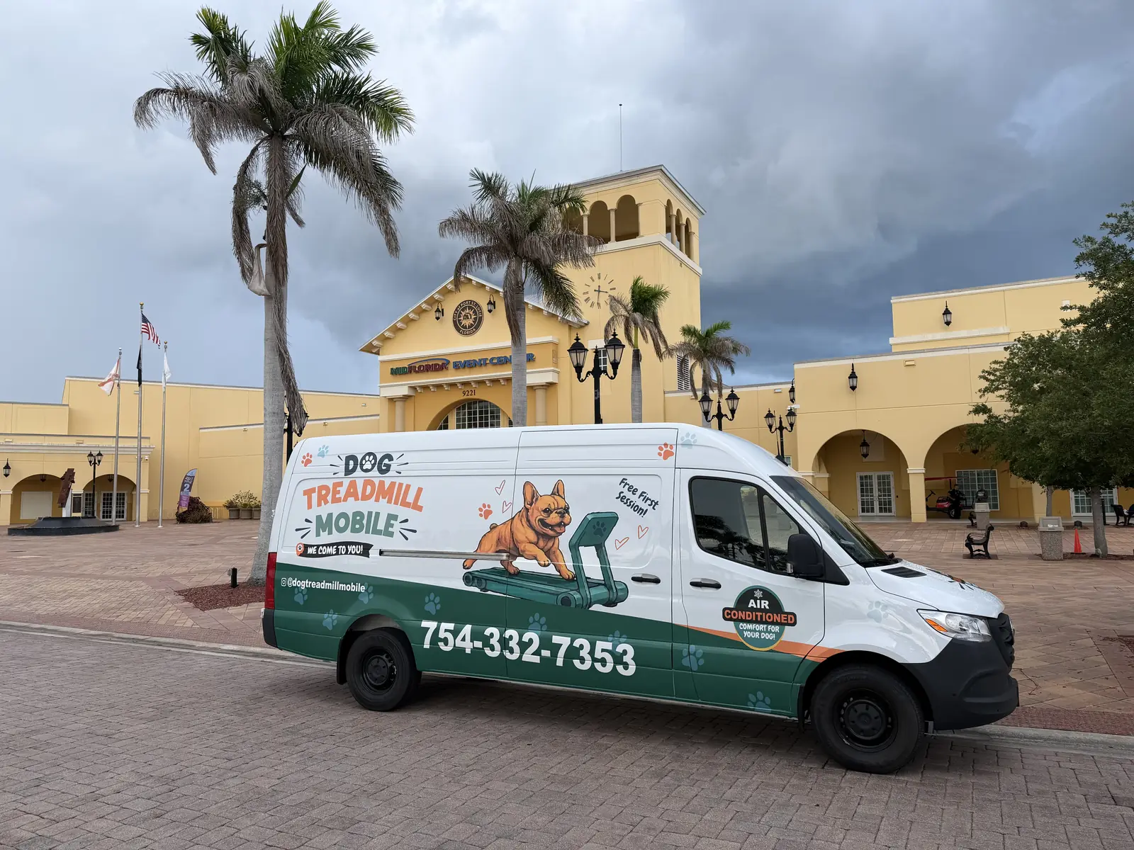 The Dog Treadmill Mobile van parked outside the MIDFLORIDA Event Center in Port St. Lucie